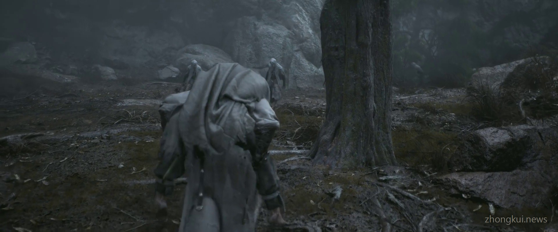 Several human-shaped spirits with cloth-wrapped heads standing in a foggy reed marsh