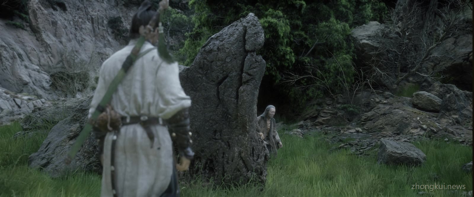 The white-robed swordsman with his green scabbard, about 1:18 in the official demo